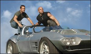 Paul Walker and Vin Diesel reprise their roles in the fifth installment of ‘The Fast and Furious’ franchise.

