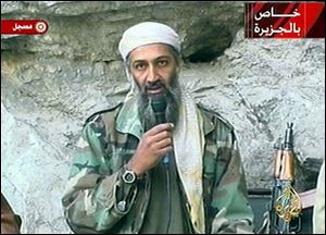 This image made from video broadcast on Sunday, Oct. 7, 2001 shows Osama bin Laden at an undisclosed location.
