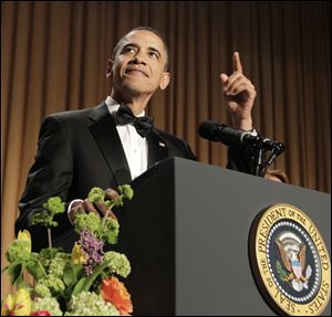 President Barack Obama starts his speech at the White House Correspondents Association Dinner in Washington, D.C.