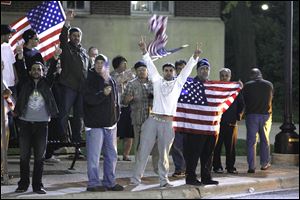Arab-Americans celebrate the news of the death of Osama Bin Laden in Dearborn, Mich., early Monday.