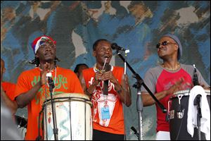 Members of the Haitian band DJA-Rara perform at the Louisiana Jazz and Heritage Festival in New Orleans.