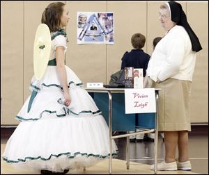 Seventh grader Mackenzie Moore, left, from Perrysburg, performs as Vivien Leigh to Sr. Mary Irenaeus Samsel, a Sister of St. Francis of Sylvania.