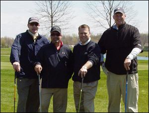 The team of Burt Jamieson, Tim Medley, Tab Hinkle, and Jake Holmes won the Ottawa County United Way Golf Invitational.