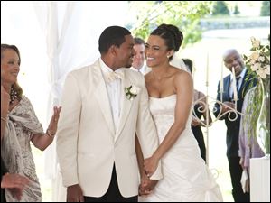 Laz Alonso, center left, and Paula Patton play lovers who come from two very different families who all come together for their wedding at Martha's Vineyard.