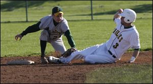 Start's Justin Cannon tags out Clay's Austin Achter at second base in Wednesday's game. The win keeps Clay in the City League title chase with a 4-1 league mark. Cannon had an RBI in the loss.