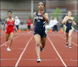 Kaila Gardner of Notre Dame wins the 400 meter dash. She won in a time of 57.88.

