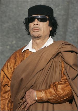 Moammar Gadhafi is named in an arrest warrant for crimes against humanity.
