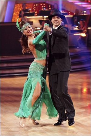 Actor Ralph Macchio, right, and his partner Karina Smirnoff were voted off 'Dancing With the Stars' Tuesday night.