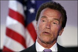Arnold Schwarzenegger speaks Tuesday at the Israel 63rd Independence Day Celebration hosted by the Consulate General of Israel in Los Angeles. Schwarzenegger was honored at the event.