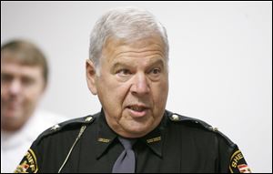 Sheriff James Telb seeks repayment for a large criminal defense bill.