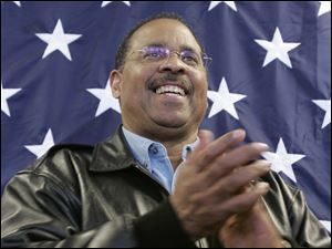 Former Republican gubernatorial candidate Ken Blackwell applauds during a 2006 campaign stop in Lima, Ohio.