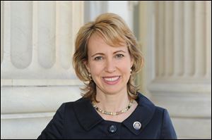 Rep. Gabrielle Giffords, D-Ariz., pictured here in March 2010, is recuperating from implant surgery on her skull.