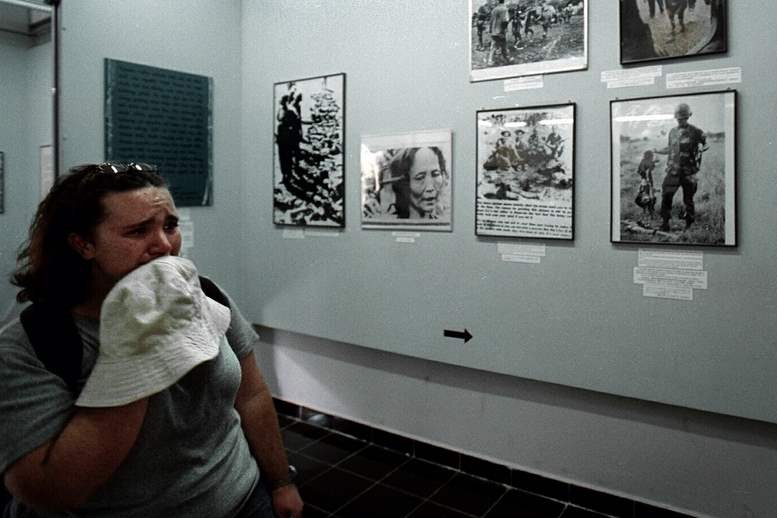 Sarah-Haggerty-can-t-hold-back-the-tears-as-she-looks-at-photographs-in-the-War-Crimes-Museum-in-Saigon