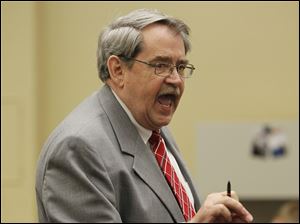 John Weglian of the prosecutor's office makes an opening statement.