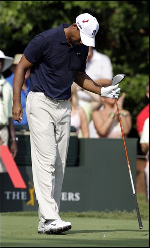 Tiger Woods has to use crutches and a walking boot now, but expects to regain strength to play in the U.S. Open in June.