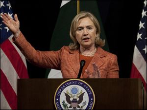 U.S. Secretary of State Hillary Rodham Clinton addresses a news conference Friday at the U. S. embassy in Islamabad, Pakistan.