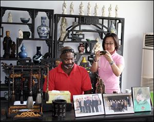 Toledo Mayor Mike Bell and Dashing Pacific Group Ltd. Chairman Yuan Xiaohong announced on Mr. Bell's final day in China that the Chinese company is again interested in purchasing the Marina District for $3.8 million.