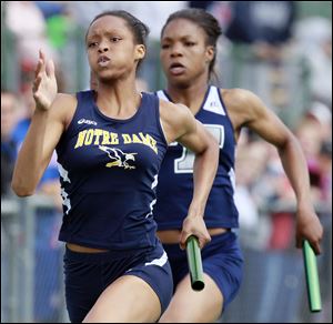 Notre Dame's Lexis Williams runs the final leg of the 4x200 meter relay during the Division I Regional track meet. Notre Dame won the event.