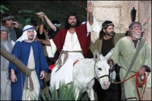 Actors portray Jesus' entrance into Jerusalem in the outdoor drama 'The Living Word.'