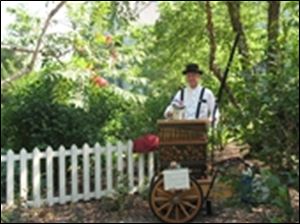 An organ grinder entertains at Roscoe Village in Coshocton, Ohio.