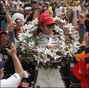 Dan Wheldon celebrates his second Indianapolis 500 victory on Sunday. He won after JR Hildebrand hit the Turn 4 wall on the last lap.