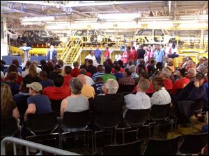 A crowd of mostly union members await President Obama's arrival Friday at the Chrysler Assembly complex.