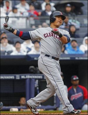 The Indians' Shin-soo Choo strikes out against the New York Yankees in the ninth inning.