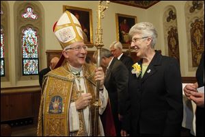 Bishop Leonard Blair chats with Ursuline Sister Nancy Mathias of Oregon, who was awarded a Benemerenti (Latin for ‘well deserved’) Medal during the closing Centenary Vesper Service.