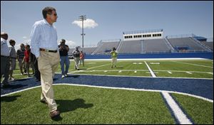 Gov. John Kasich  tours the Lake High School football stadium during a visit Monday to Lake Township, which was devastated by a June, 2010 tornado. 