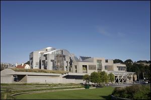 The design of the Scottish Parliament won Britain's Stirling Prize for its contribution to British architecture, despite discoveries of structural flaws. Its $623 million price tag far exceeded initial estimates. 