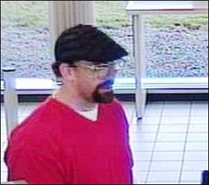 Police are searching for this man who robbed the PNC Bank at 1831 Laskey Rd. Wednesday morning.