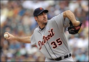Tigers pitcher Justin Verlander throws in the first inning of a game against the Colorado Rockies. He threw his fourth complete game of the year.