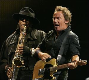 Bruce Springsteen, right,  performs alongside Clarence Clemons on saxophone during a concert  in Madrid in 2008.