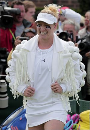 Bethanie Mattek-Sands of the US arrives on court prior to her match against Japan's Misaki Doi at the All England Lawn Tennis Championships at Wimbledon.
