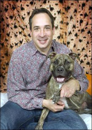 Cleveland Councilman Matt Zone rescued Gordon, a ‘pit bull,’ after the puppy was hit by a truck three years ago.