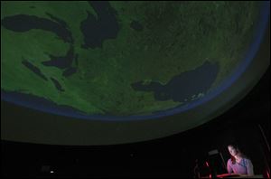 Laura J. Megeath is the planetarium coordinator at the Appold Planetarium at Lourdes College.