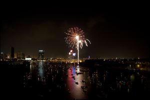 Fireworks explode over the Maumee River during last year's festivities.