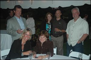From left, Paul Haye, Kelly Murray, Ruth Haye, Adrian Odendahl, Ryan Odendahl, and mark Murray at Schedel Arboretum and Gardens.