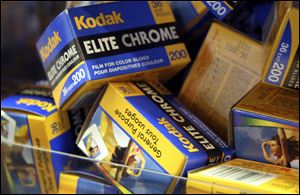 For years, Eastman Kodak Co. was synonymous with photography. Now struggling to remake itself, Kodak hopes for a lucrative win in the U.S. International Trade Commission. Its opposition: Apple and Research in Motion.  