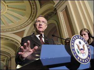 Senate Majority Leader Harry Reid (R., Nev.,) speaks to reporters following the Democrats' weekly policy luncheon this week on Capitol Hill in Washington. 
