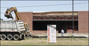 An AutoZone Inc. parts store under construction on Alexis Road west of Hageman Road in North Toledo is part of the rise in construction jobs cited by the Associated General Contractors of America.