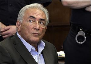 Former International Monetary Fund leader Dominique Strauss-Kahn listens to proceedings in his case in New York state Supreme Court in May.