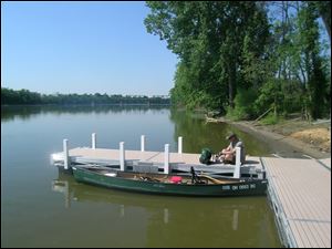A look back through the lock into the canal at Providence-Grand Rapids Dam on the Maumee River. The canal and lock lead to downtown Grand Rapids.