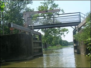 A look back through the lock to the canal at Providence-Grand Rapids Dam on the Maumee River. The canal and lock lead to downtown Grand Rapids.