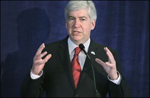 Michigan Gov. Rick Snyder delivers an address earlier this year in Detroit on changes he wants to see in education. 
