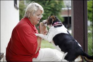 Marilyn Schnapp, a professional pet sitter who has owned Luv’n Your Pets for 12 years, says she enjoys being around animals.