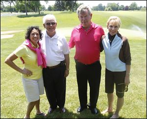 From left, Rita Mansour, Harvey Tolson, Don Finnegan, and Barbara Steele, during the Toledo Hospital golf outing at the Inverness Club.