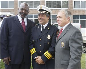 Toledo mayor and former Toledo Fire Department chief Mike Bell, left, Chief Luis Santiago, and retired chief Michael Wolever.