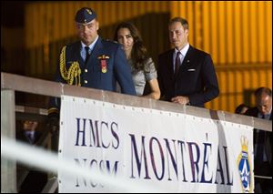 The Duke and Duchess of Cambridge arrive on board the HMCS Montreal  in Montreal Saturday to depart for Quebec City.