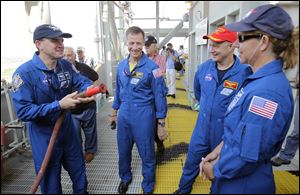 Crew members for the final space shuttle mission are, from left, specialist Rex Walheim, Commander Chris Ferguson, co-pilot Doug Hurley, and specialist  Sandy Magnus. NASA was looking for veterans when it cobbled together a crew for Atlantis that has seven spaceflights among its members.associated press